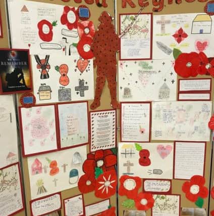 Heartfelt Remembrance Day messages and pictures by pupils at St Giles Church of England Primary School in Horsted Keynes