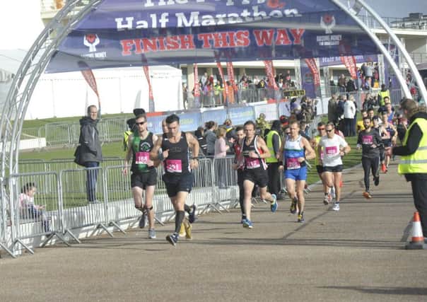 Runners set off at the start of the 2018 Poppy Half Marathon on Bexhill seafront. Pictures by Simon Newstead