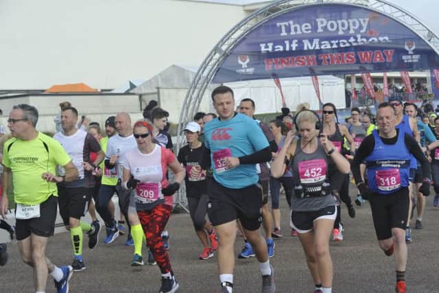 Some more of the half marathon competitors set off on their 13.1-mile challenge