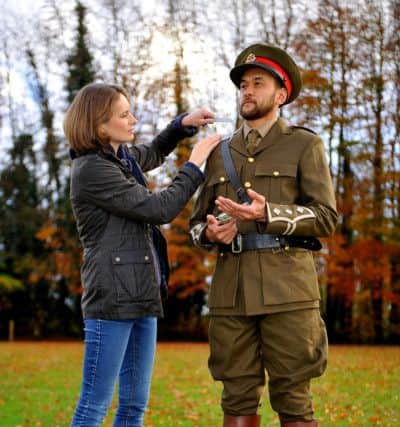 Sculptor Hannah Stewart with Kingslea School teacher Darrell Mothee who stepped in to act as a model for the bronze of Captain Nevill. Pic Steve Robards SR1830103 SUS-181211-172948001