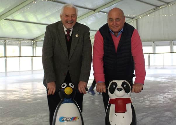 Councillor Chris Mullins, Cabinet member for Wellbeing at Crawley Borough Council, and David Fearn, operator of Crawley Ice Rink in Goffs Park