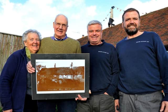 Sarah and Paul Wehrle with Warren and Scott Dodds, owners of Kaycee Roofing Ltd, as they staged a historic Armistice photo in Burgess Hill. Photo by Steve Robards