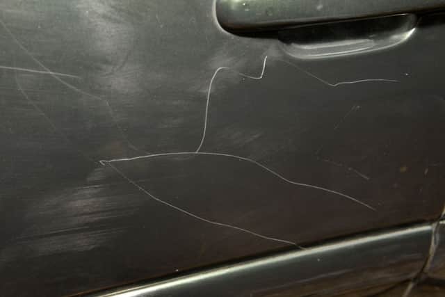 The car was also keyed (Photo by Jon Rigby)
