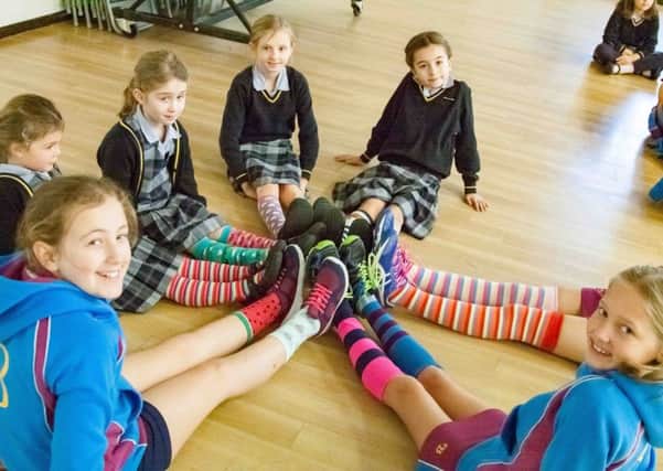 A few of the pupils showing off their odd socks