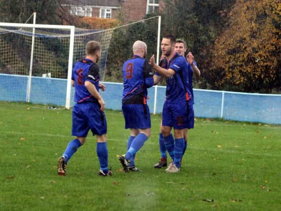 Midhurst celebrate their goal at home to Sids / Picture by Kate Shemilt