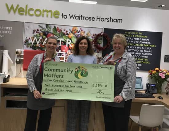 Sally Pavey centre with Marilyn Pike and Amanda King, community matters champions at Waitrose