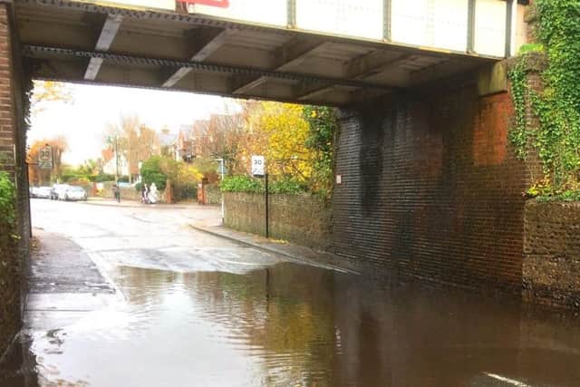 Flooding under the Southdown Road railway bridge in Shoreham in 2016. Picture by Will Flewett