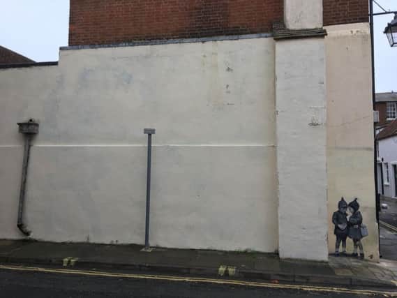 The North Pallant wall where 'King of Cats' used to be