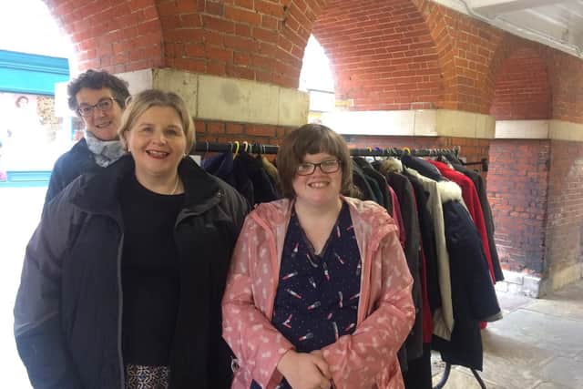 Chichester Community Coat Rack launch 2018. Four Streets Project Fiona Bell with Donna Ockenden and her daughter Phoebe.