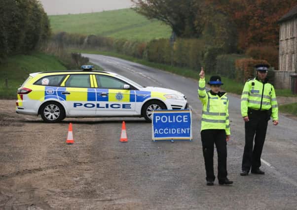 Police at the scene of the collision last Tuesday