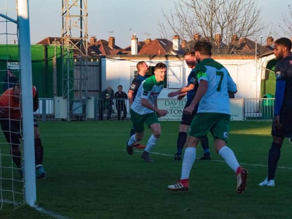 Dan Smith sets off to celebrate the Rocks' opener - set up by Brad Lethbridge / Picture by Tommy McMillan