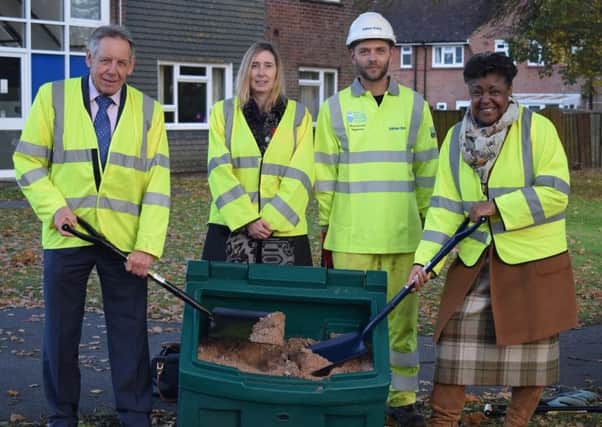 Roger Elkins, county council Cabinet Member for Highways and Infrastructure, Sue Furlong, council Community Initiatives Principal Theme Lead, Lee Liston from Balfour Beatty Living Places, and Debbie Kennard, Cabinet Member for Safer, Stronger Communities, at a salt bin in Chichester.