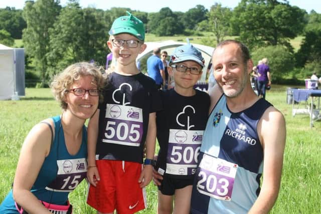 The Jerome family, from left, Katherine, Eli, nine, Noah, six, and Richard at the first Focus 10k fixture this year. Photograph: Derek Martin/ dm1860666a