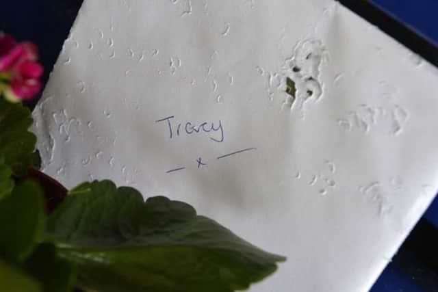 Tributes were left at the seafront shelter where Tracy's body was found