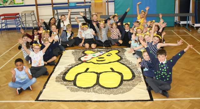 Year four children from Rowling Class, with Pudsey.