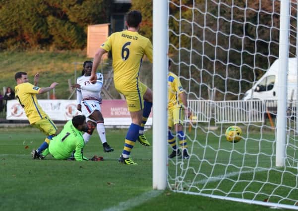 Youssouf Bamba scores Hastings United's opening goal in their 3-1 weekend league win at home to Whitstable Town. Picture courtesy Scott White
