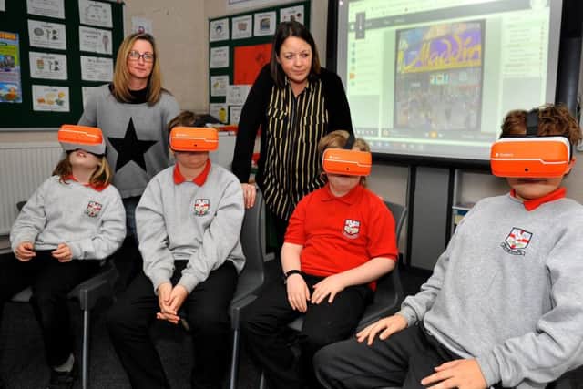 Virtual reality headsets are being used at Farney Close School in Bolney. Photo by Steve Robards