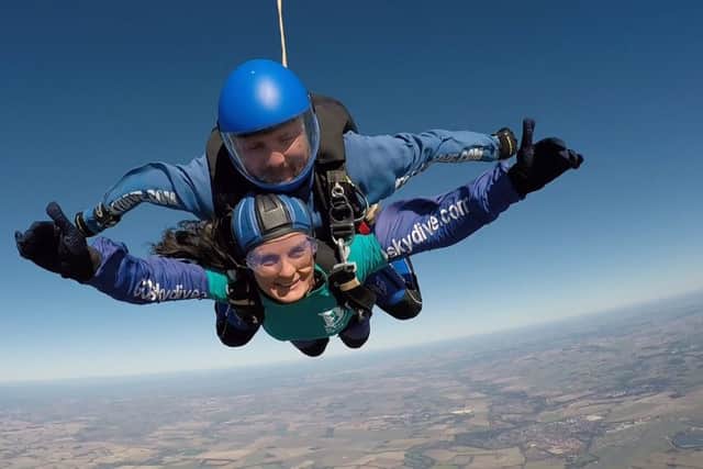 Tanya Ellett, pictured mid-skydive, has raised more than Â£1,800 for St Barnabas House