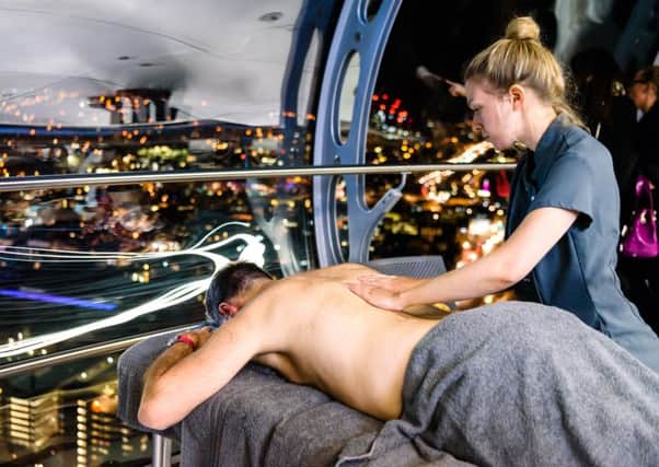 A guest at British Airways i360 enjoys a HarSPA mid-air massage Â©Julia Claxton Photography