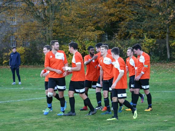 Celebration time as Chichester take on St Mary's / Picture by Jordan Colborne