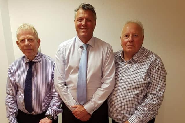 (Left to right) Worthing United sponsor Peter Saywell, chairman Bill Clifford and vice-chairman Mark Sanderson