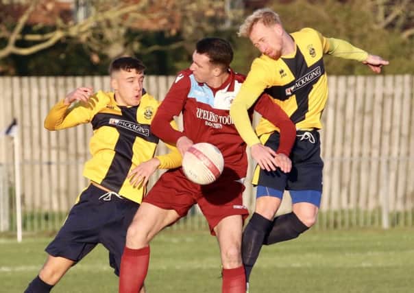 Liam Ward competes for an aerial ball during Little Common's 1-0 defeat at home to Eastbourne Town last weekend. Picture courtesy Joe Knight