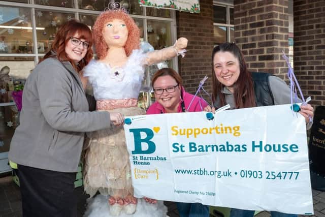 Michelle Bly, head designer, and staff with the incredible fairy they created for the charity day at The Flower Shop in Wick. Picture: Scott Ramsey