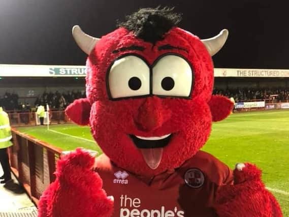 Crawley Town mascot Reggie the Red warming up the 3000+ crowd at the FA Cup replay with Southend.
