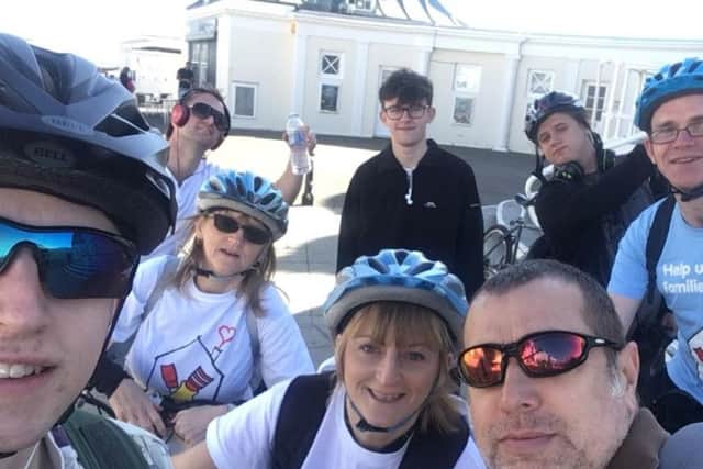 The bike ride team reach Worthing Pier