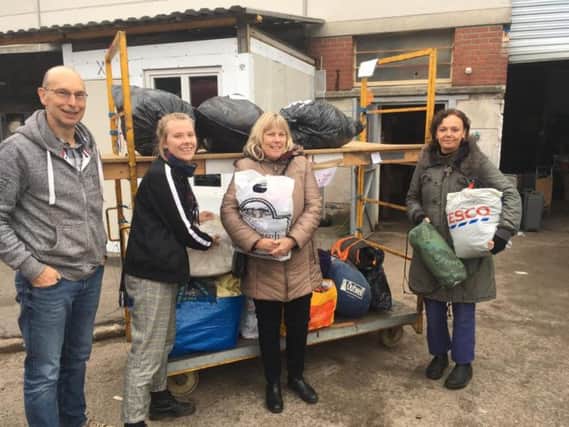 The donated Chichester items reach Calais accompanied by Dave Barton, Lucy Wooding, Linda Wooding and Sue Gilson