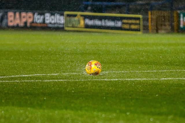 The waterlogged pitch at Mansfield Town. Picture by Chris Holloway, The Bigger Picture