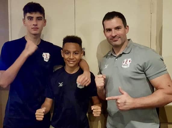 L - R: Daniel Hardinge, Jaidan Wyatt, and club coach Stuart Smith travelled to Bridport in Dorset with both boxers' unbeaten runs on the line. Picture courtesy of Shaun Brown Boxing Academy.