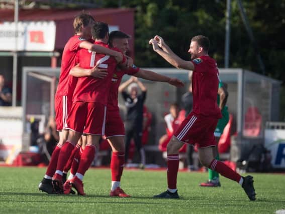 Worthing celebrate a goal this season. Picture by Marcus Hoare