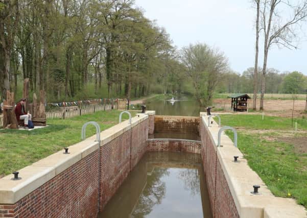 Gennets Bridge Lock - The Wey & Arun Canal Trust in Loxwood is urging supports to help them with a match-funding scheme called 'Grow Your Tenner' SUS-181012-143054001