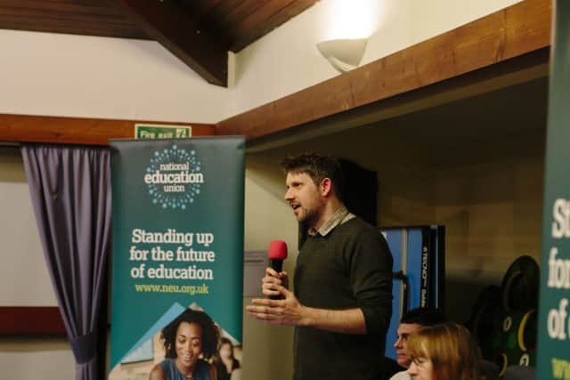 Phil Clarke from the National Education Union addresses a meeting called to discuss proposals by Lewes schools to form a multi-academy trust (photo by Sarah Weal)