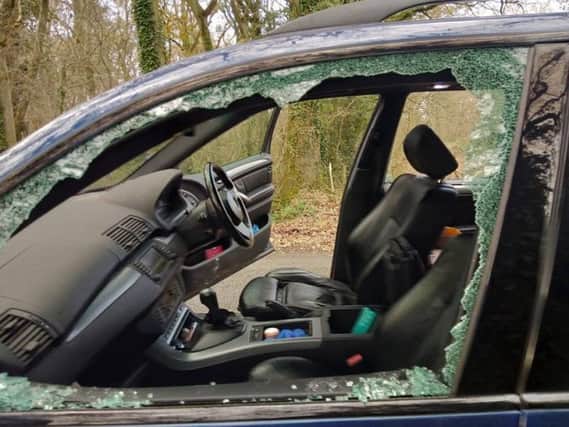 Windows were smashed in a car parked in Hooklands Lane, Shipley. SUS-181129-104024001