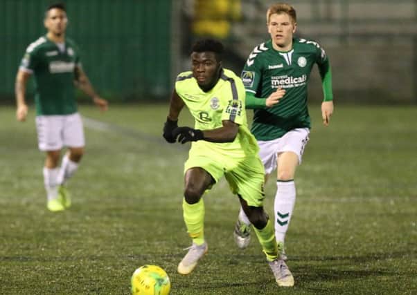 Daniel Ajakaiye on the ball during Hastings United's 2-0 defeat away to Whyteleafe on Tuesday. Picture courtesy Scott White