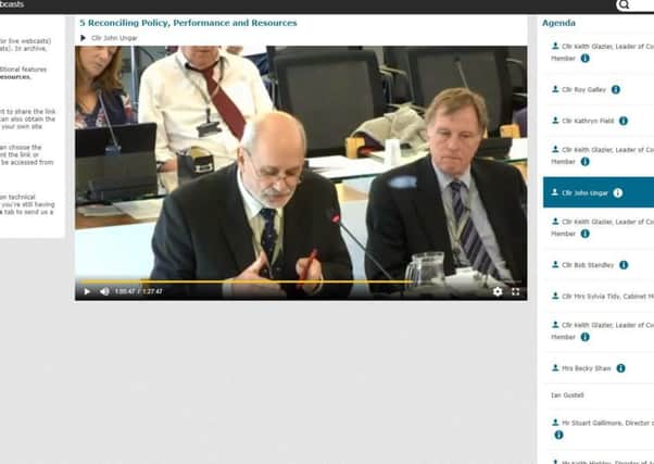 John Ungar speaking at a council meeting being webcast. He wants to extend the webcasting facilities to cover all scrutiny meetings