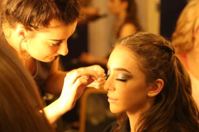 Crawley College Hair & Beauty students working behind the scenes