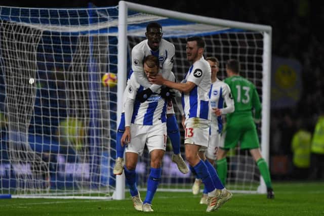 Muted celebrations from Glenn Murray against his former side after putting Brighton & Hove Albion ahead from a soft penalty. Pictures by PW Sporting Photography