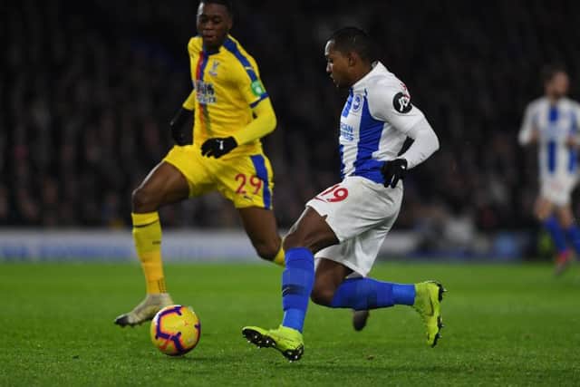 Jose Izquierdo races away down the left-hand flank with Aaron Wan-Bissaka giving chase. Picture by PW Sporting Photography