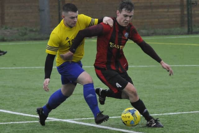 South Coast Athletico and Hawkhurst United II tussle for possession