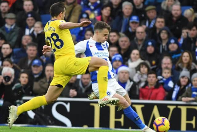 Solly March looks to send a cross in under pressure from Cesar Azpilicueta. Picture by PW Sporting Photography