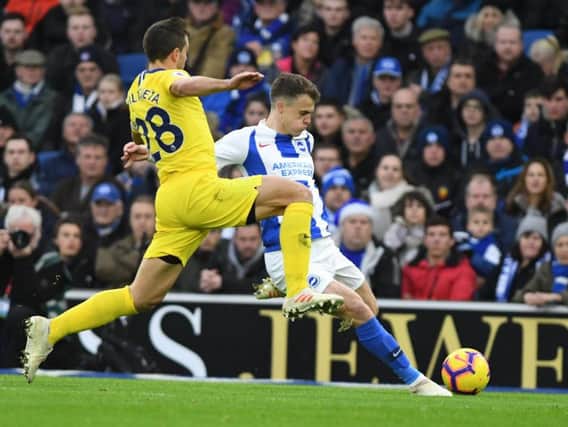 Solly March looks to send a cross in under pressure from Cesar Azpilicueta. Picture by PW Sporting Photography