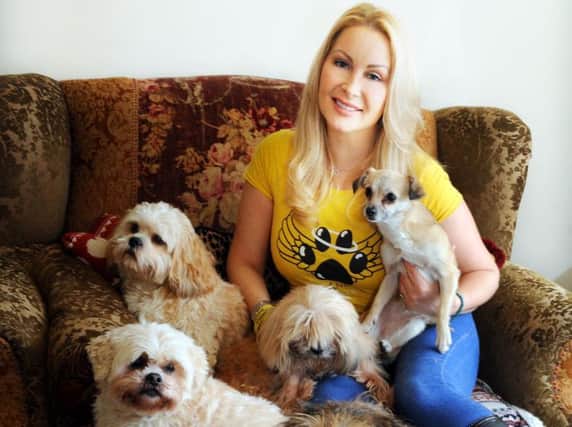 K-9 Angels co-founder Victoria Featherstone Pearce from Pulborough with some of her rescue dogs