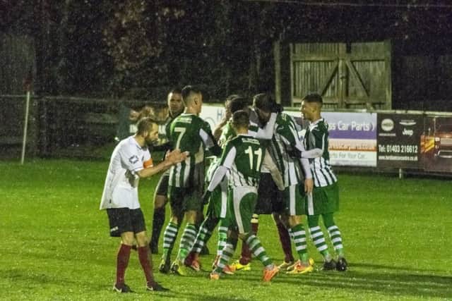 Chichester City celebrate their goal against Horsham YMCA. Picture by Daniel Harker