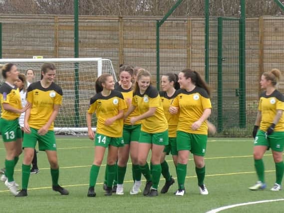 Chichester City celebrate on their way to victory over Bexhill