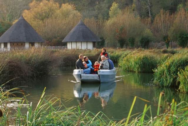 Family on a boat at Arundel Wetland Centre