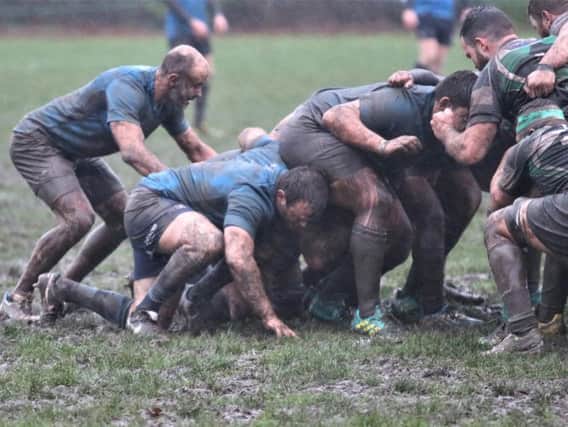 Scrum time in the mud for Chichester at Tottonians / Picture by Alison Tanner