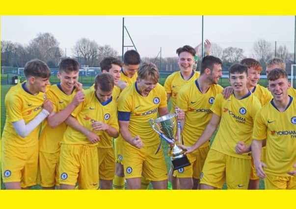 The Bexhill College football academy celebrates its cup final victory